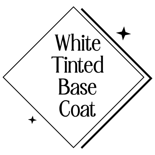 A black diamond-shaped outline with the text 'White Tinted Base Coat' in a serif font, plus two small star accents on a white background.